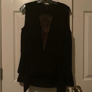 Black peplum with built in lacet in front